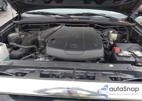 2015 Toyota Tacoma Base V6 из США, поврежденный, VIN 3TMLU4EN2FM198101